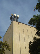 central office building with microwave tower on top