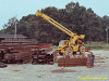North yard of Fabarc Steel showing stacks of fabricated steel and mobile crane.