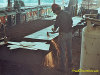 Fabarc employee cutting templates on cutting table. Photo taken by Frank Overstreet in south bay looking south. 